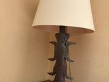 a lamp that is sitting on top of a wooden table