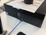 a plant that is sitting on top of a computer