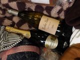 many bottles of wine and other items in a bag