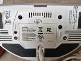 a white and black electronic device connected to a charger