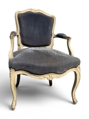 an image of a chair with a blue upholstered seat