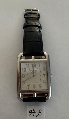 a watch that is on display on a table