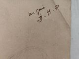 an old piece of paper with a drawing of a woman ' s face