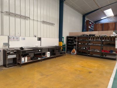 an image of a large industrial kitchen in a warehouse