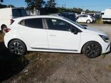 a white car that is parked in a parking lot