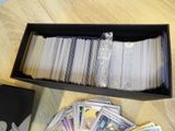 a box full of cards sitting on a table