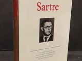 an image of a book with a picture of a man in a suit and tie