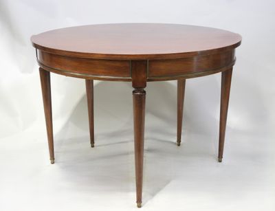 une image représentant une table en bois avec deux pieds et un plateau rond