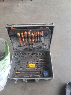 many tools in a tool case on the floor