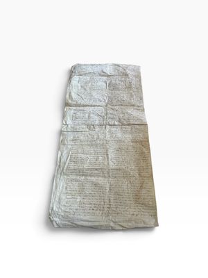 a piece of paper that has been folded up on a table