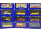 many different cars in a blue box on a white background