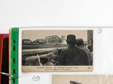 a binder with a picture of a man standing in front of a train