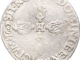 a close up of a coin on a white background