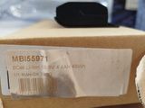 a box with a stuffed animal inside of it on a table