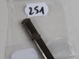 a small piece of metal that is in a bag