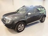 a picture of a grey dacia parked in a garage