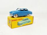 a blue toy car sitting on top of a yellow box