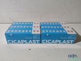 a couple of boxes of cigarettes sitting on top of a table