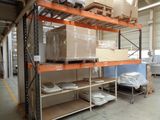 many boxes and boxes on the shelves in the warehouse