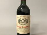 a bottle of wine that is sitting on a table