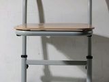 a chair that is sitting in the corner of a room