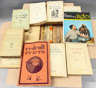 several books are stacked on top of each other on a table