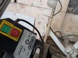 an image of a water heater with a hose attached to it