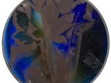 a picture of a circular picture of a flower in a vase