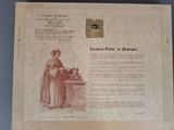 a picture of an old newspaper with a picture of a woman in a dress