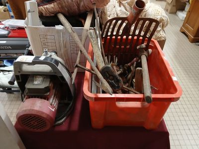 a basket full of tools on a table in a room