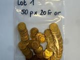 a lot of gold coins in a bag on the table