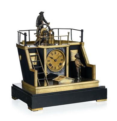 a black and gold clock with a man on a boat