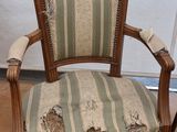 a chair with a stripped seat and a stripped cushion