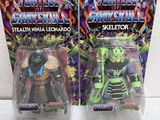 two action figures of the same character are shown in front of each other