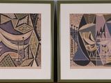 deux tableaux encadrés accrochés au mur