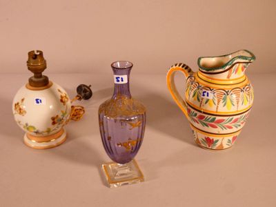 three different types of vases sitting on a table