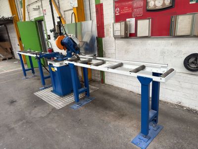 a picture of a machine that is working on a piece of metal
