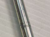 a metal pipe that is sitting on a table