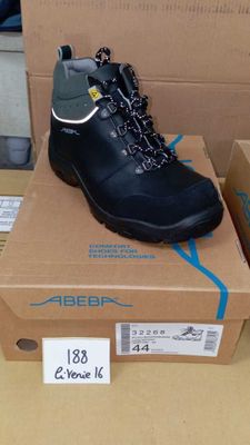 a box with a pair of black shoes on it