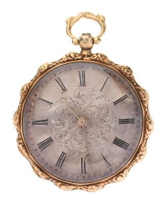 a gold pocket watch with roman numerals on it
