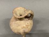 a small vase that is sitting on a table