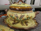 a yellow and brown bowl and plate on a table