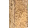 an old book sitting on top of a table next to a white background
