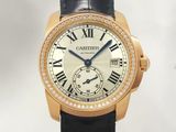 Montre Cartier Calibre de Cartier en or rose 18 carats avec lunette sertie de diamants