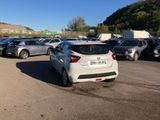 a lot of cars that are parked in a parking lot