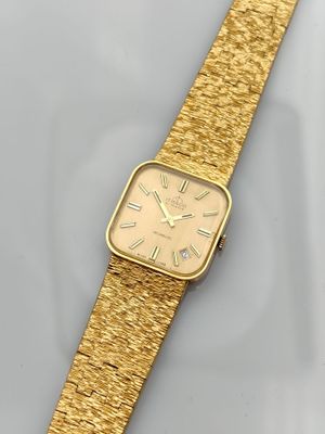 Montre Rolex pour femme à bracelet en or 18 carats