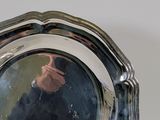 a man taking a picture of himself in a mirror