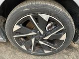 a close up of a tire on a car ' s rim