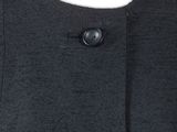 a close up of the back of a woman ' s dress with buttons