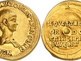 a gold coin with a portrait of a man on it
